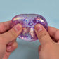 SugarSqueez Squishies® Glitter Heart Maltose Fidget Stress Ball (1pc) Assorted Colors
